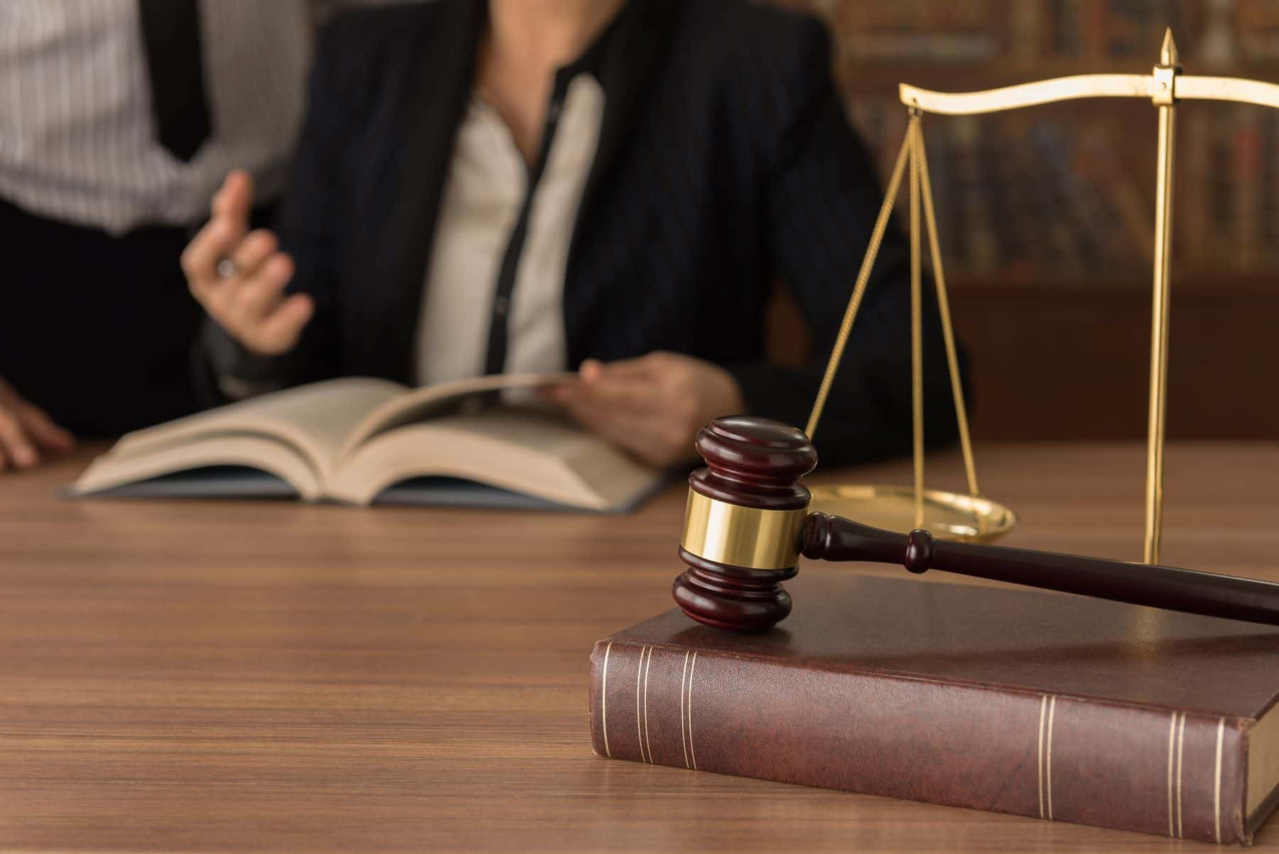 Attorneys reading through book