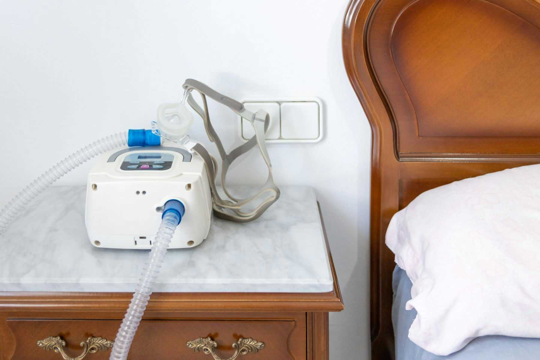 BiPAP machine on bedside table