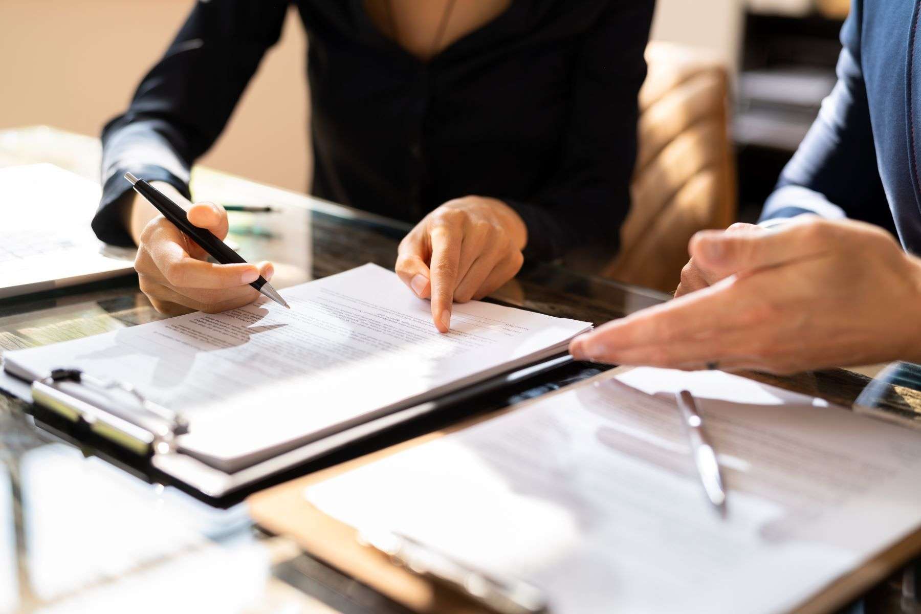 Attorneys reviewing contracts