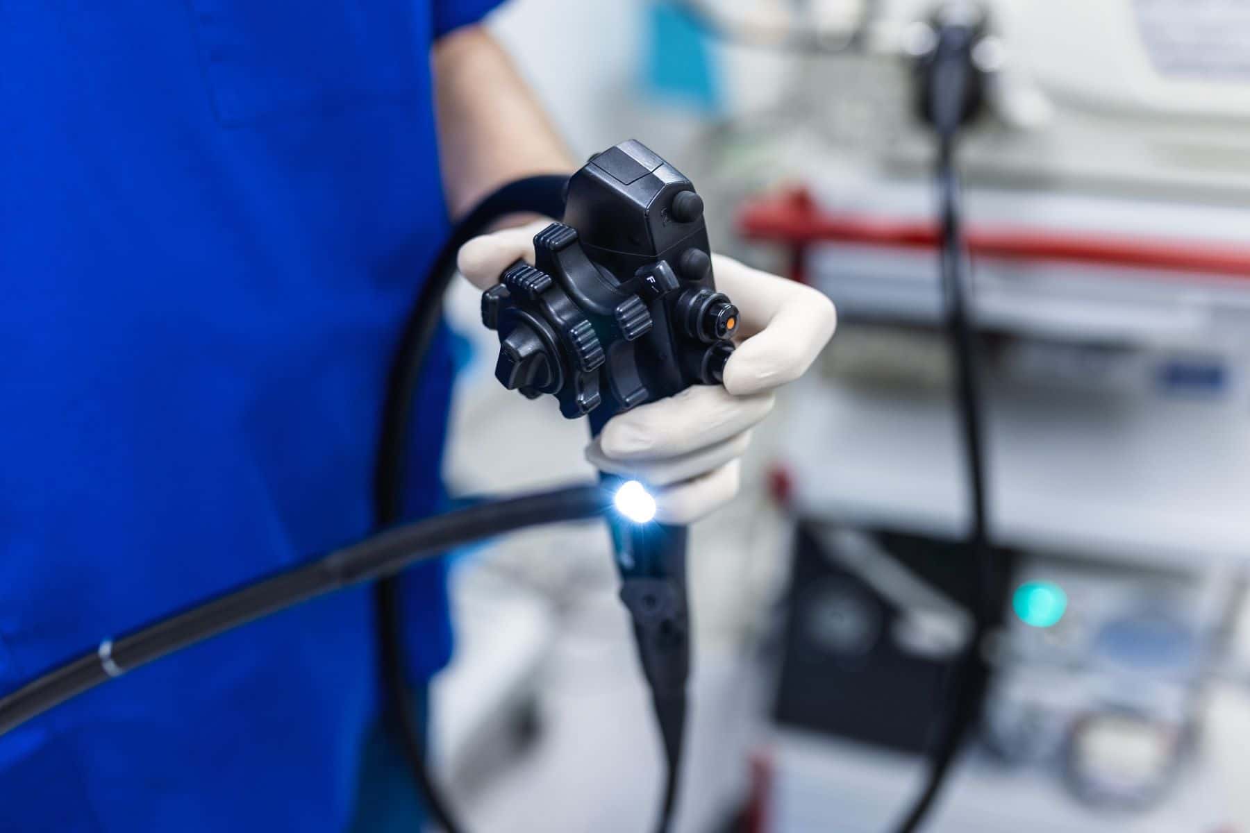 Doctor holding colonoscopy device