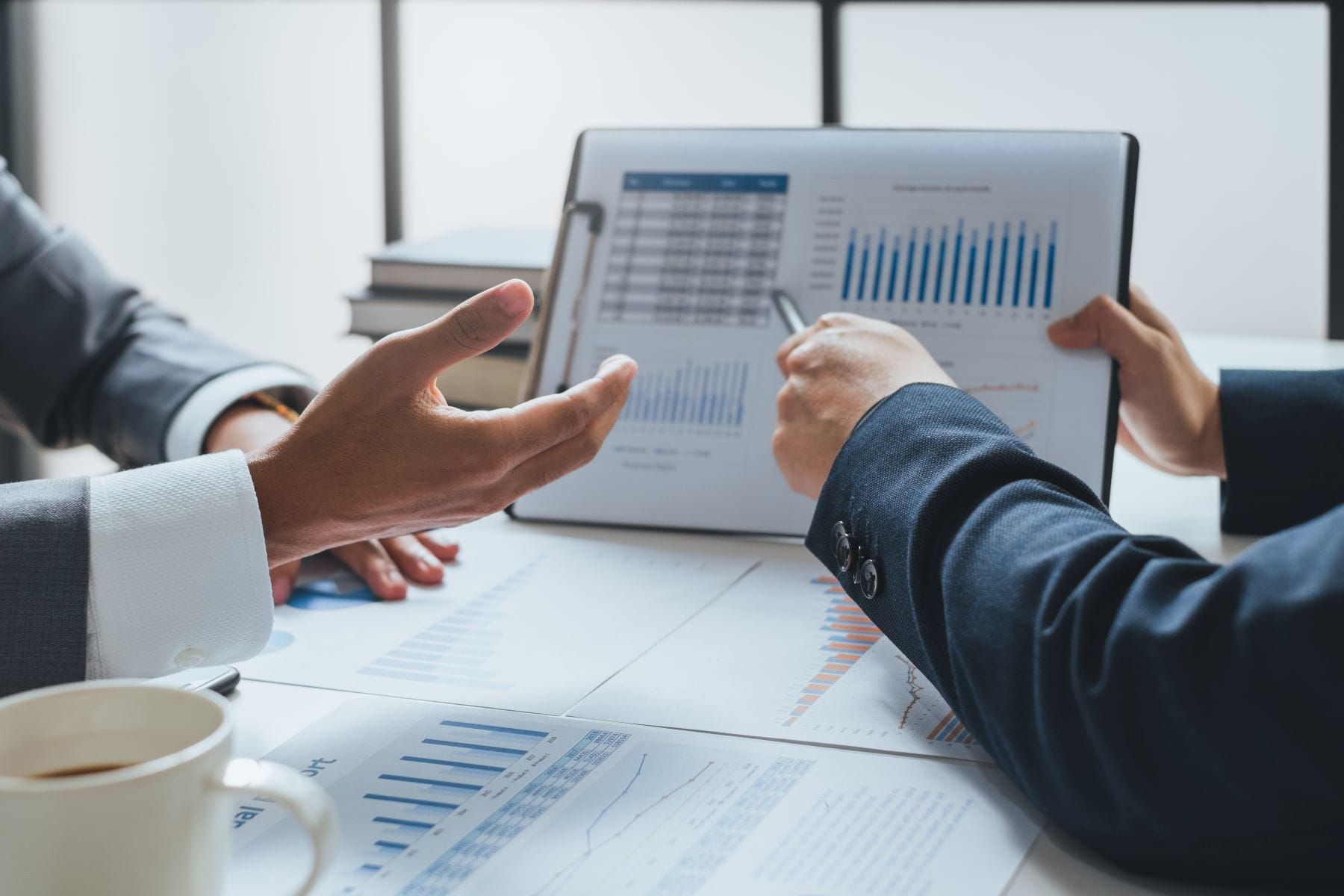 Professionals reviewing financial charts