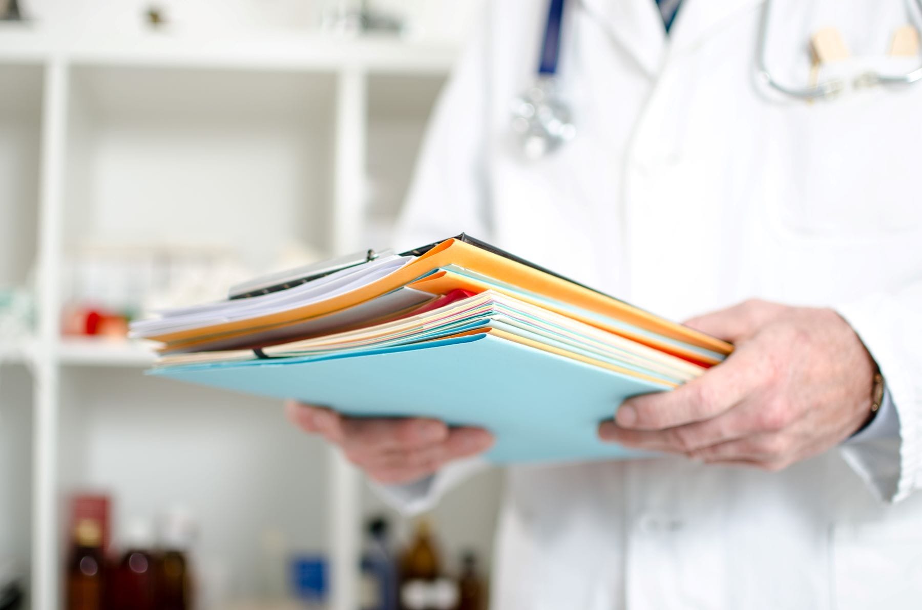 Doctor holding files
