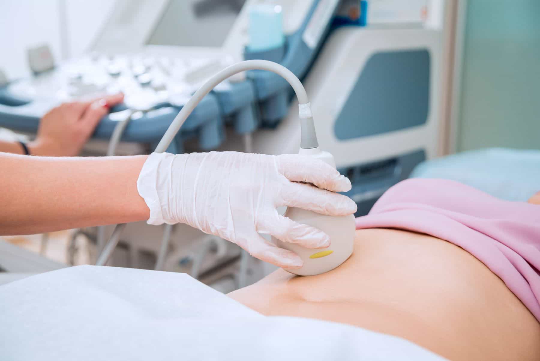 Pregnant woman receiving an ultrasound